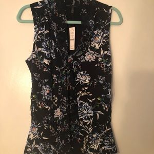 Black blouse with floral details